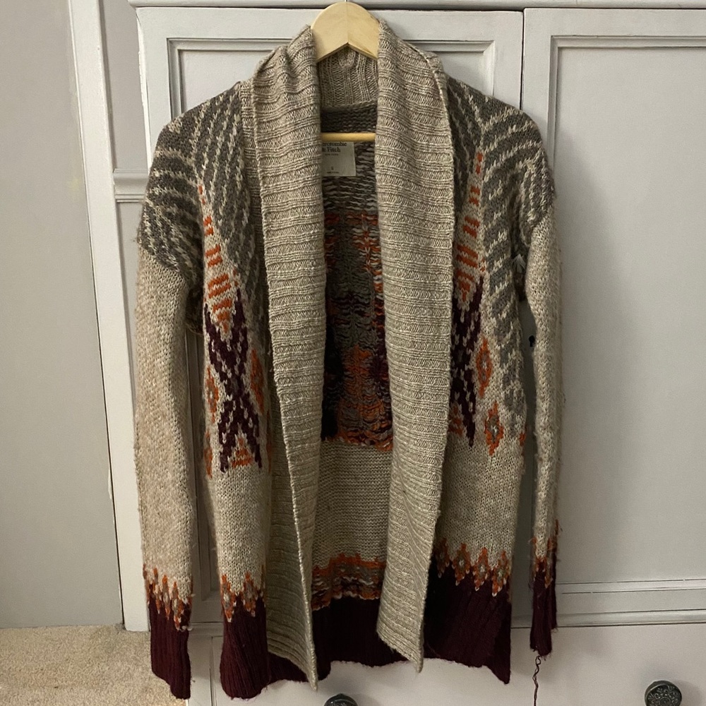 Long knitted sweater